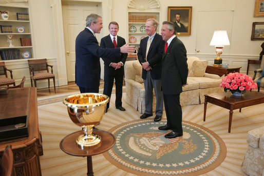 Gary Player and Jack Nicklaus with President George W. Bush and PGA Tour commissioner Tim Finchem ahead of the 2005 Presidents Cup.